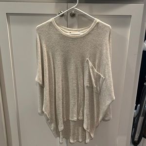 The impeccable, pig light long flowing sweater